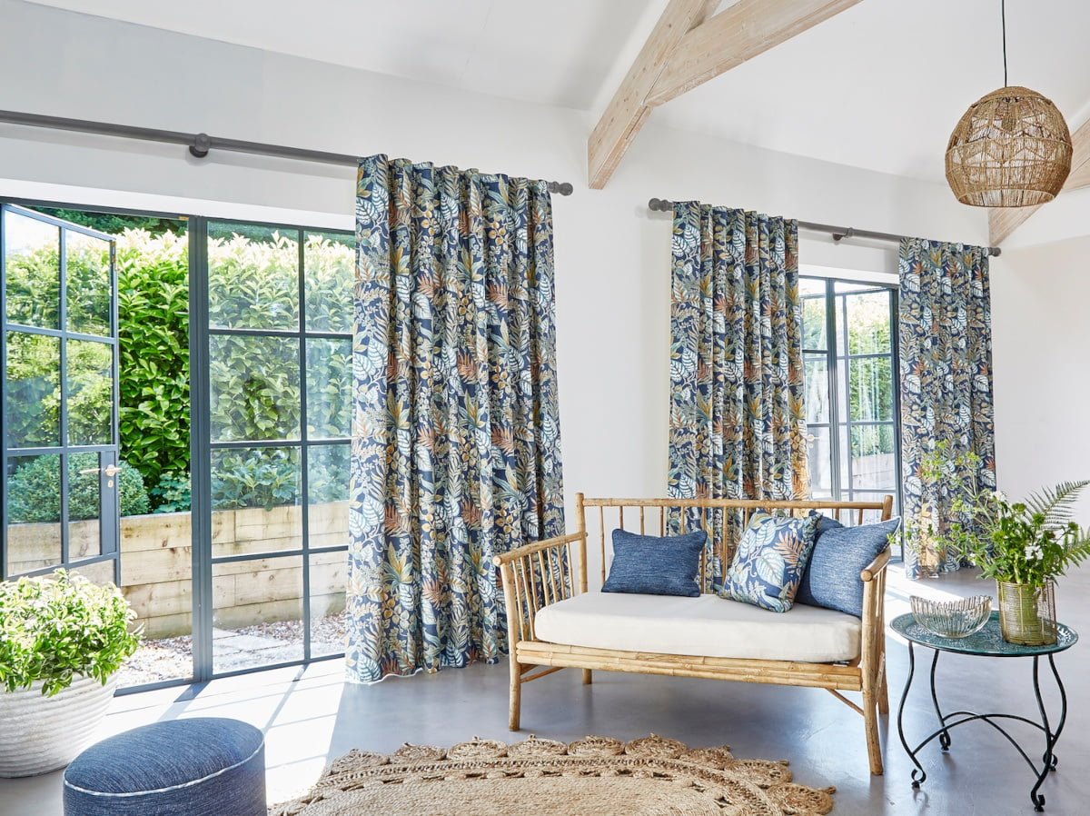 Patterned curtains on garden room